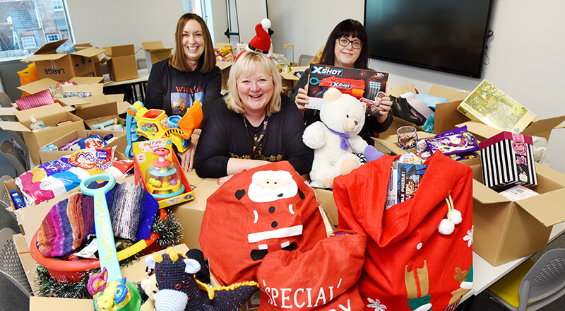 Social sharing card for Teesside University winter campaign supporting local communities